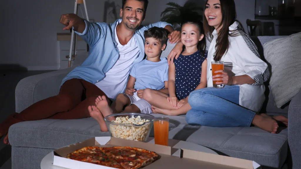 Happy family watching tv